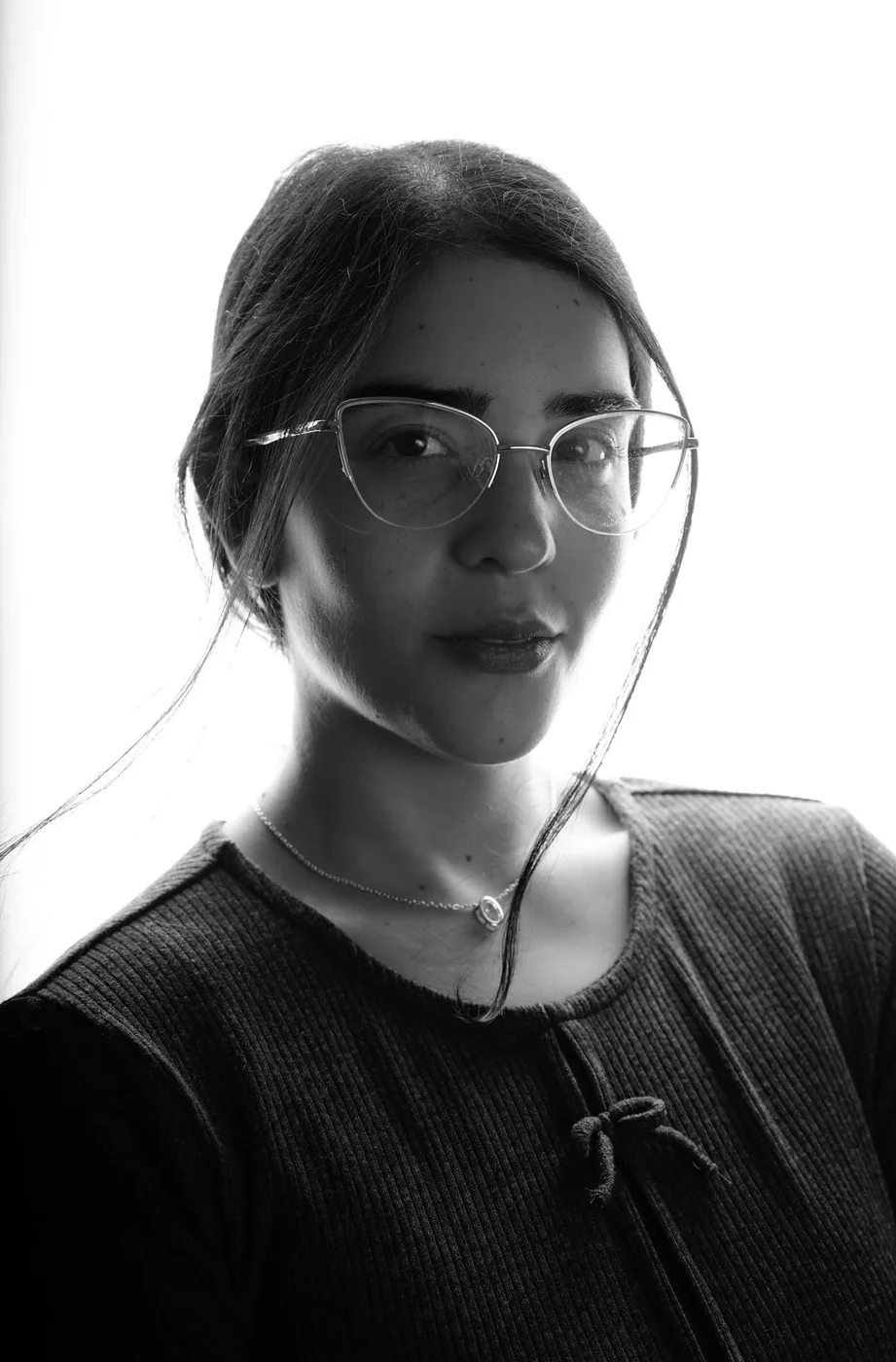 Hadar Bosmat, photographed against a window